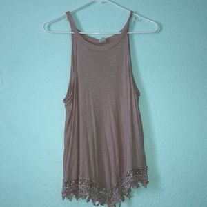 Super cute long tank top with detail at the bottom